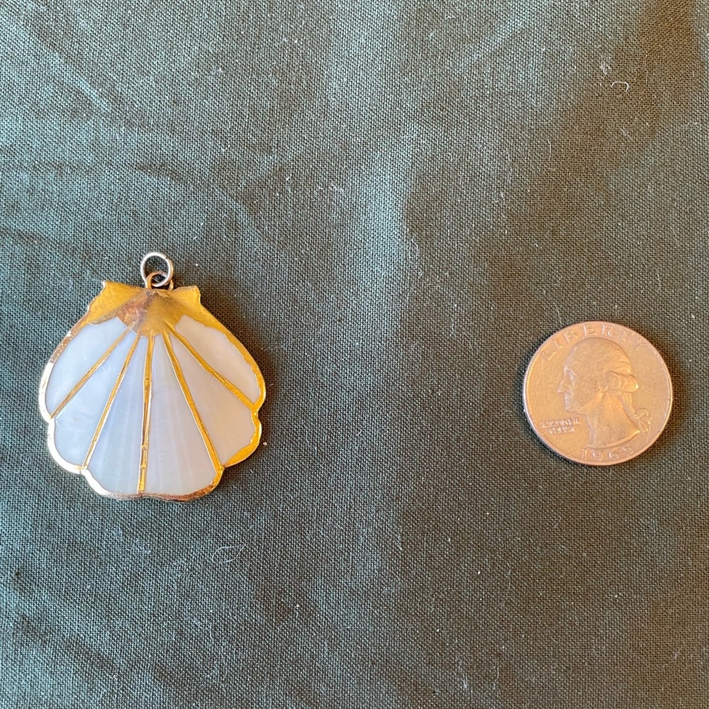 Beautiful white shell covered in real gold.